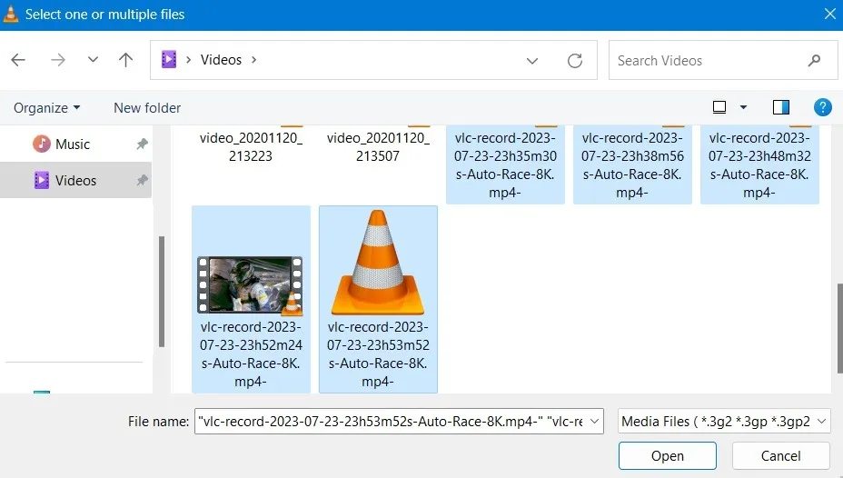 從 Windows 計算機文件夾中選擇多個文件以插入到 VLC 中。