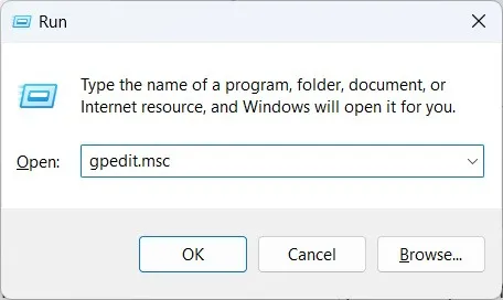 Abriendo el Editor de políticas de grupo local usando Windows Run.