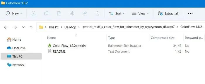 Arquivo Rainmeter RMSKIn baixado visível na pasta do Windows.