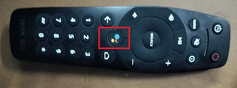 Pressione o botão do Google Assistente em um controle remoto da Android TV