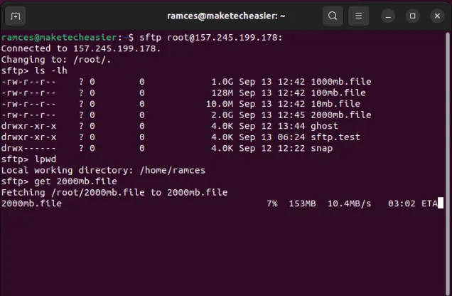 Una terminal que muestra el mensaje SFTP transfiriendo archivos desde un servidor remoto a una máquina local.