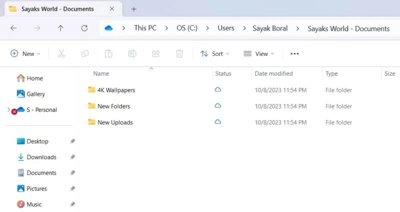 Documents du site Web SharePoint disponibles dans le dossier OneDrive sur un PC Windows 11.