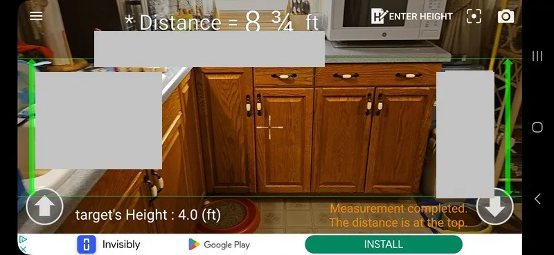 Pomiar odległości szafek za pomocą aplikacji Smart Distance.