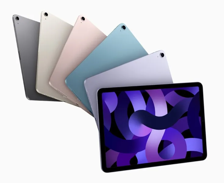 Plusieurs iPads de différentes couleurs sur fond blanc-gris