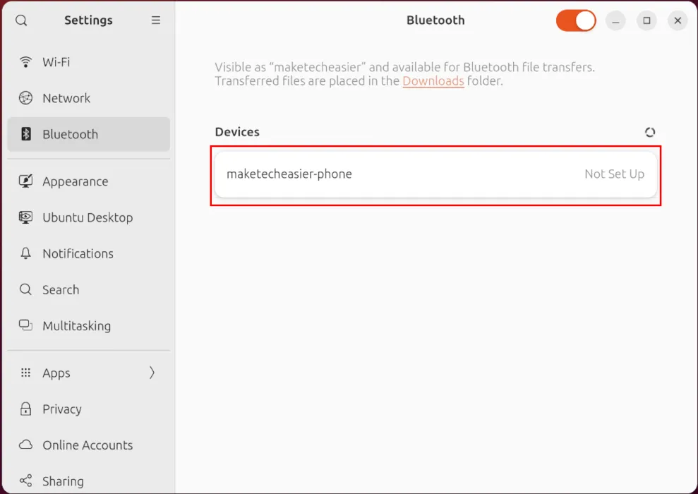 Een screenshot waarin het Bluetooth-label van de telefoon wordt benadrukt.