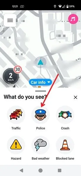 Tocar no botão Polícia no aplicativo Waze.