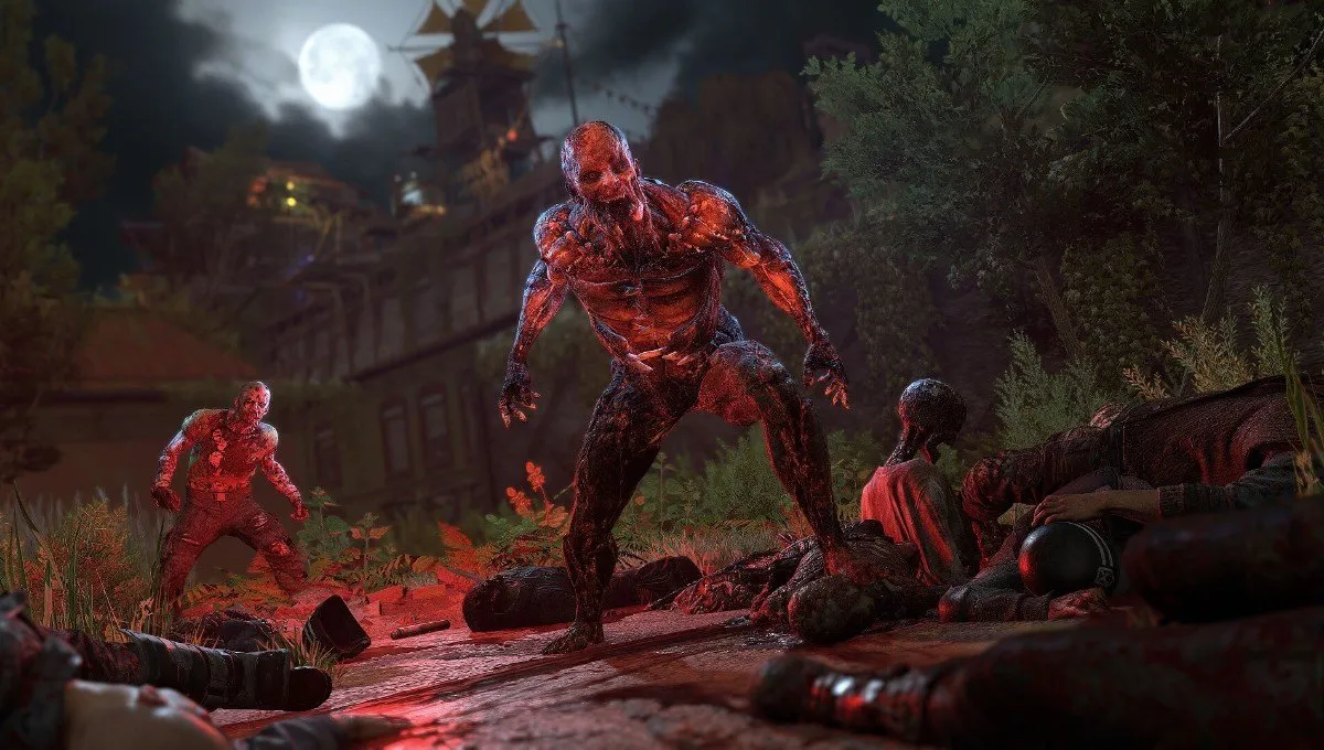 Screenshot uit Dying Light 2 waarin een zombie 's nachts naar de hoofdpersoon staart