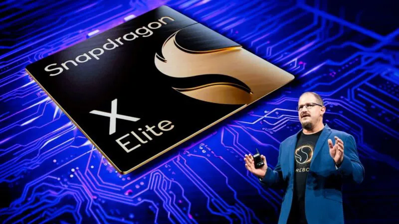 Qualcomm CEO Cristiano Amon op het podium en toont Snapdragon X Elite CPU