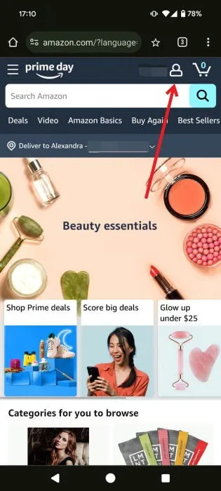 Kliknięcie ikony w kształcie człowieka w Amazon w przeglądarce mobilnej.