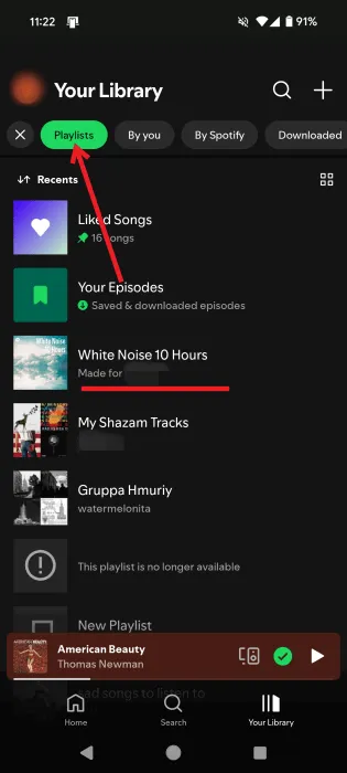 Przechodzenie do playlist w aplikacji Spotify na Androidzie i wybieranie playlisty.