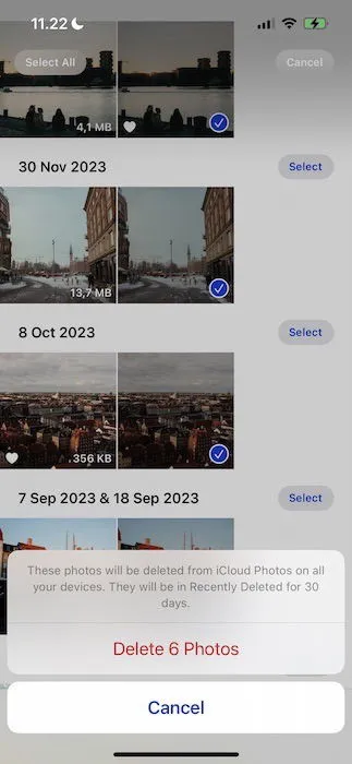 Conferma di voler eliminare le immagini duplicate nell'app Foto di iOS