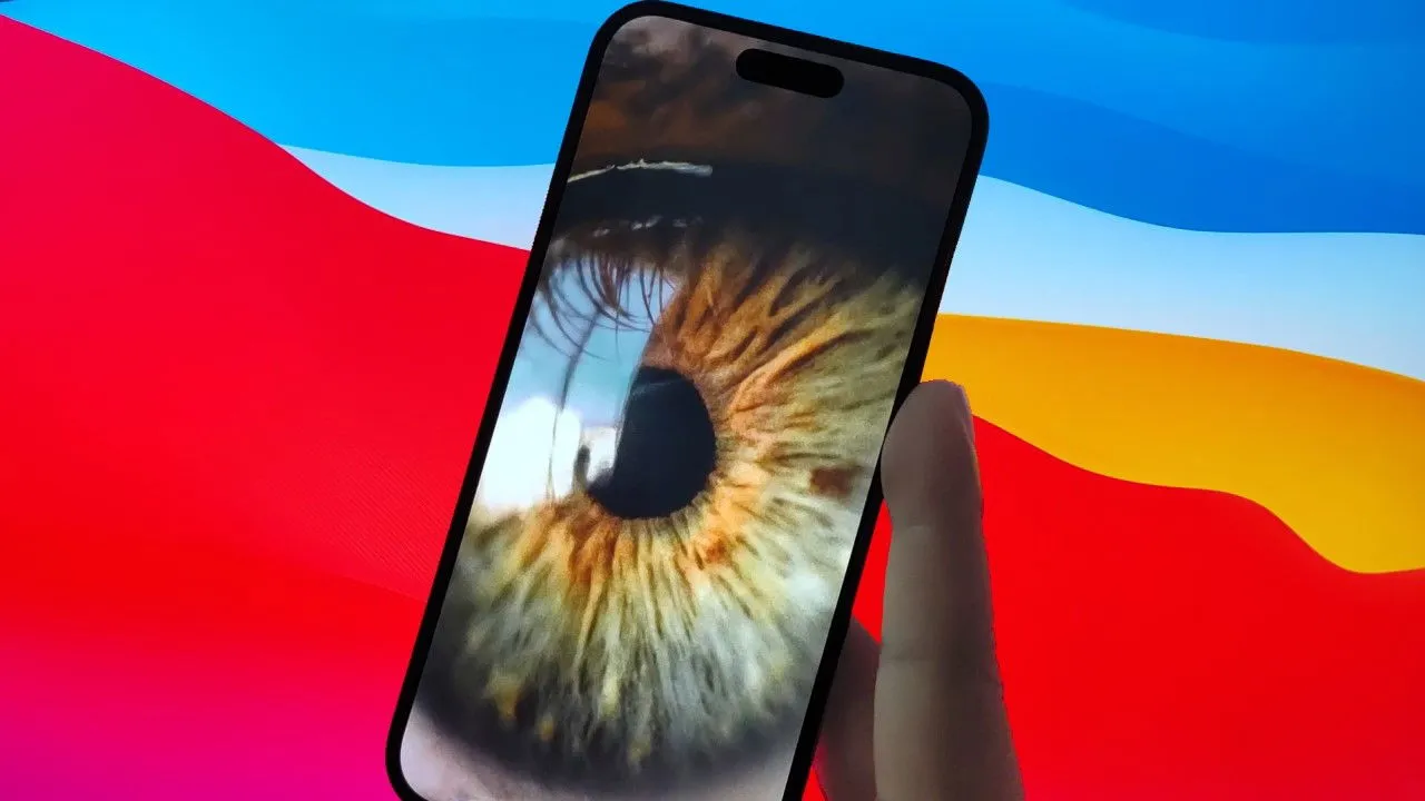 Una ilustración que muestra un iPhone frente a una interfaz de MacOS, con un ojo en la pantalla del teléfono.