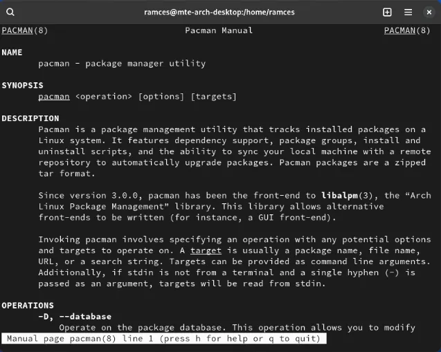 A terminal displaying the pacman package manager's manual page.