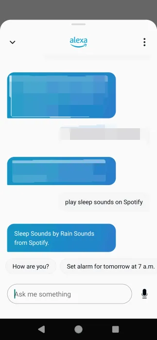 Asking Alexa to play music on Spotify via the Amazon Alexa app.