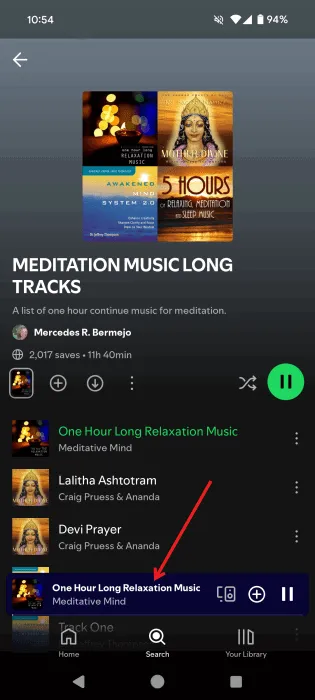 Tocando la barra Reproduciendo ahora en la aplicación Spotify.