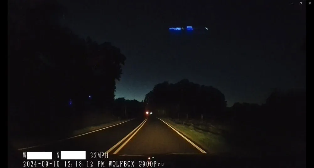 Wolfbox front camera at night while driving.