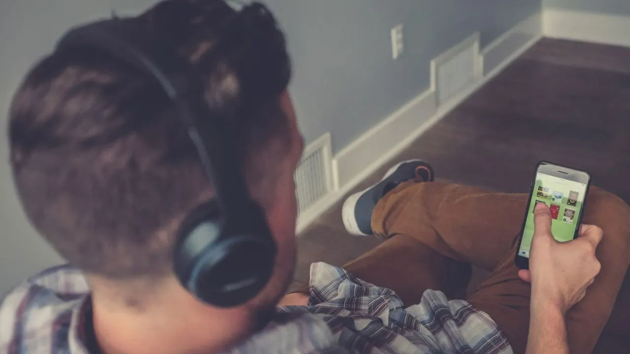 Man enjoying audiobooks.