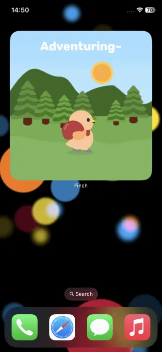 Finch virtual pet displayed on iPhone.