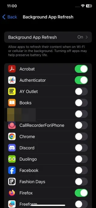 Turning off background app refresh for specific apps on iPhone.