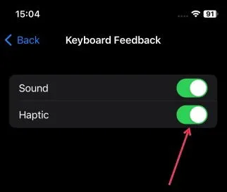 Disabling the haptic setting in iPhone Settings.