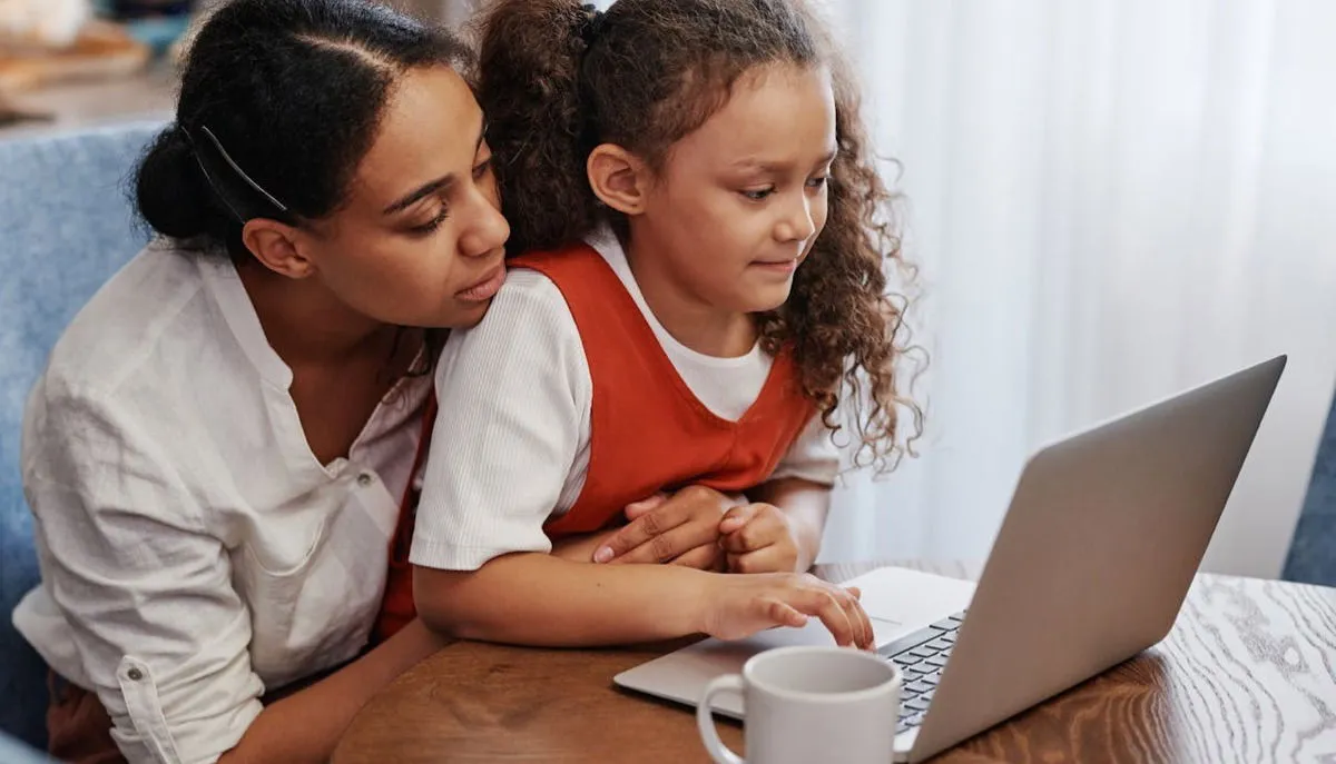 Mother Daughter Using Computer