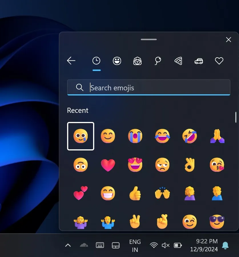 Panel emoji na pasku zadań